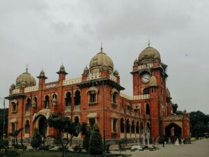 A beautiful, red-brick building with domes